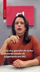 Juiz vira garrafa de vinho durante sessão de julgamento em MG Juiz vira garrafa de vinho durante sessão de julgamento em MG